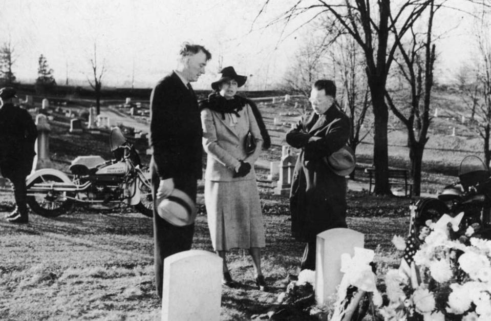 History Lesson: Eleanor Roosevelt Visits Evansville
"The First Lady of the Land" as a local newspaper dubbed Eleanor Roosevelt, wife of President Franklin D. Roosevelt, was warmly welcomed when she visited Evansville on November 13, 1937, to deliver a lecture to the Woman's Rotary Club. One of her stops in the city was Locust Hill Cemetery, where she is seen here with Mayor William Dress (left) and Congressman John W. Boehne, Jr. (right). She laid white flowers on the grave of James Bethel Gresham, who was the first American to die in World War I. Afterwards the First Lady inspected Lincoln Gardens, then under construction, before heading to the Hotel McCurdy. During a press conference, she commended Evansville for recovering so quickly from a major flood earlier in the year. (Photographer: Thomas Mueller)