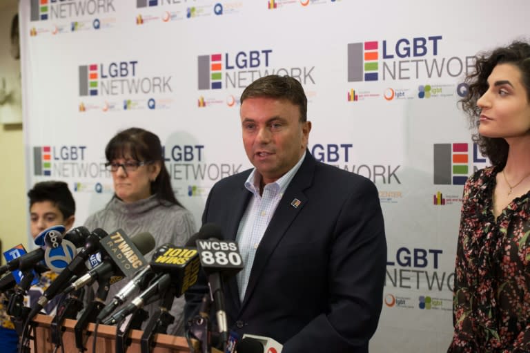 New York LGBT Network CEO David Kilmnick (C), joined by Long Island transgender parents and students, speaks at a press conference on February 23, 2017 in Woodbury, New York