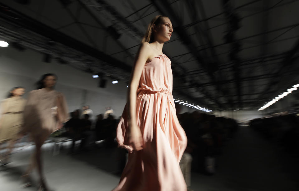 A model wears a creation as part of the N. 21 Spring-Summer 2020 collection, unveiled during the fashion week, in Milan, Italy, Wednesday, Sept. 18, 2019. (AP Photo/Luca Bruno)