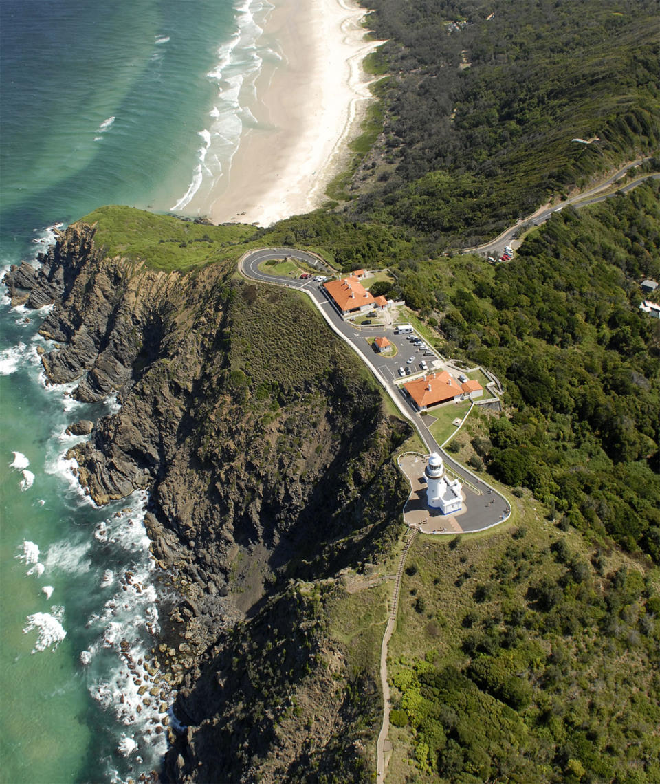 The NSW mum arrived at Cape Byron to find a ‘wall of emergency personnel’ as she searched for her son. Pictured is the Cape Byron lighthouse with Tallow Beach in the background. Source: Getty, file