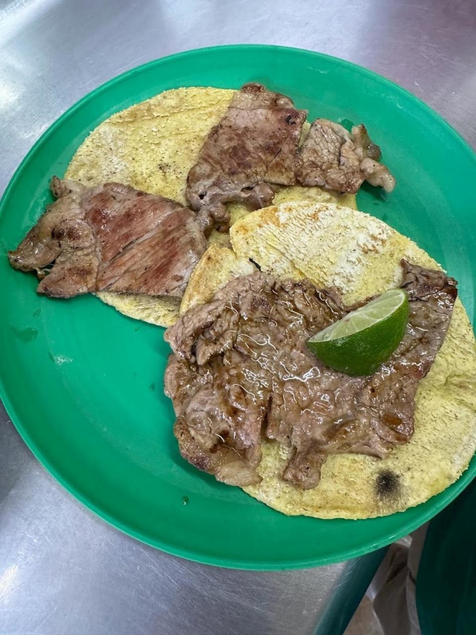PHOTO: A plate of tacos at Taquería El Califa de León in Mexico City. (The MICHELIN Guide)