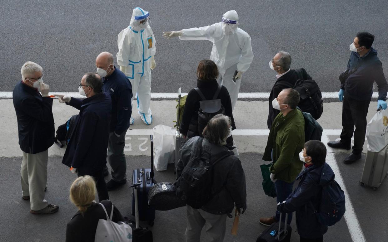 A World Health Organization tram arrived in Wuhan, China, on Thursday to investigate the origin of the coronavirus pandemic - AP