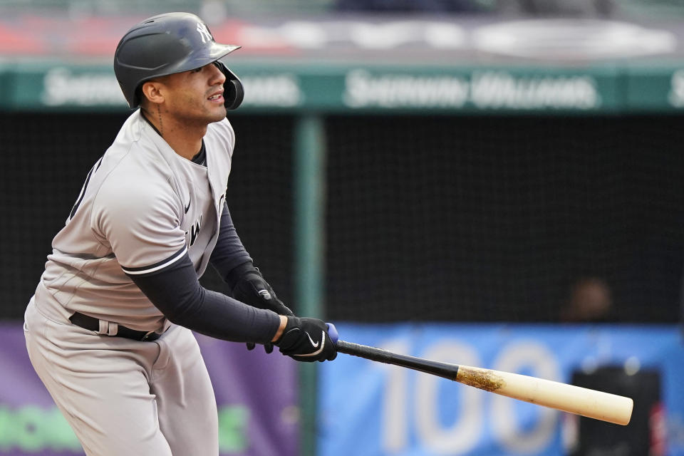 New York Yankees' Gleyber Torres watches his two-run single in the third inning of a baseball game against the Cleveland Indians, Thursday, April 22, 2021, in Cleveland. (AP Photo/Tony Dejak)