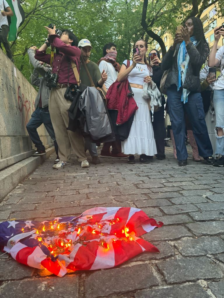 Police have released images of the protester wanted for burning the American flag at a demonstration earlier this week. Jack Morphet/NY Post