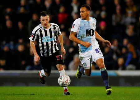 Soccer Football - FA Cup Third Round Replay - Blackburn Rovers v Newcastle United - Ewood Park, Blackburn, Britain - January 15, 2019 Blackburn Rovers' Elliott Bennett in action with Newcastle United's Callum Roberts Action Images via Reuters/Jason Cairnduff