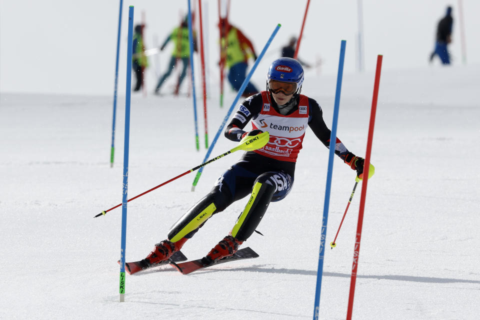 United States' Mikaela Shiffrin competes during the first run of an alpine ski, women's World Cup slalom race, in Saalbach, Austria, Saturday, March 16, 2024. (AP Photo/Alessandro Trovati)