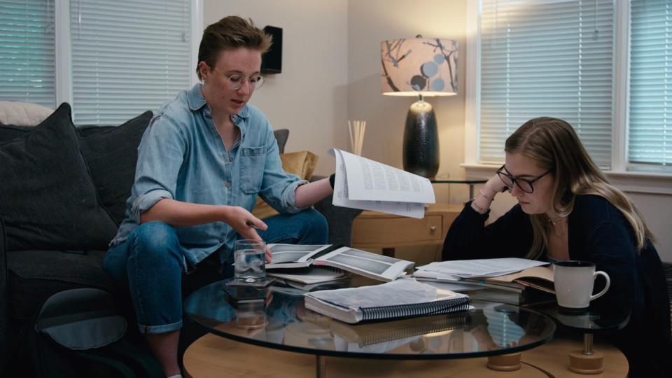 PHOTO: Two of Christina Boyer's advocates, who took on the case as part of a 2019 class project at Georgetown University, pore over details of her case. (ABC News Studios)