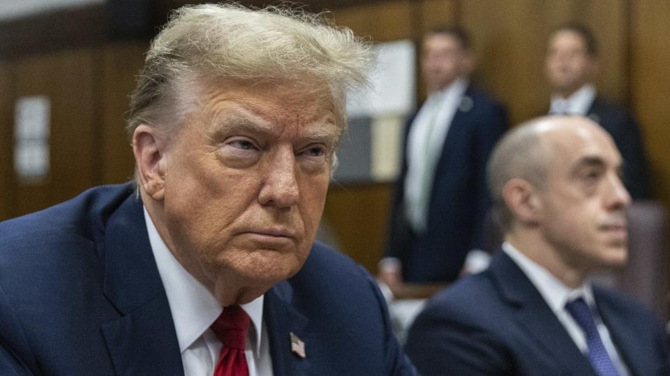 FILE - Former President Donald Trump attends jury selection at Manhattan criminal court in New York, April 15, 2024. Trump's criminal hush money trial involves allegations that he falsified his company's records to hide the true nature of payments to his former lawyer Michael Cohen, who helped bury negative stories about him during the 2016 presidential campaign. He's pleaded not guilty. (Jeenah Moon/Pool Photo via AP, File)