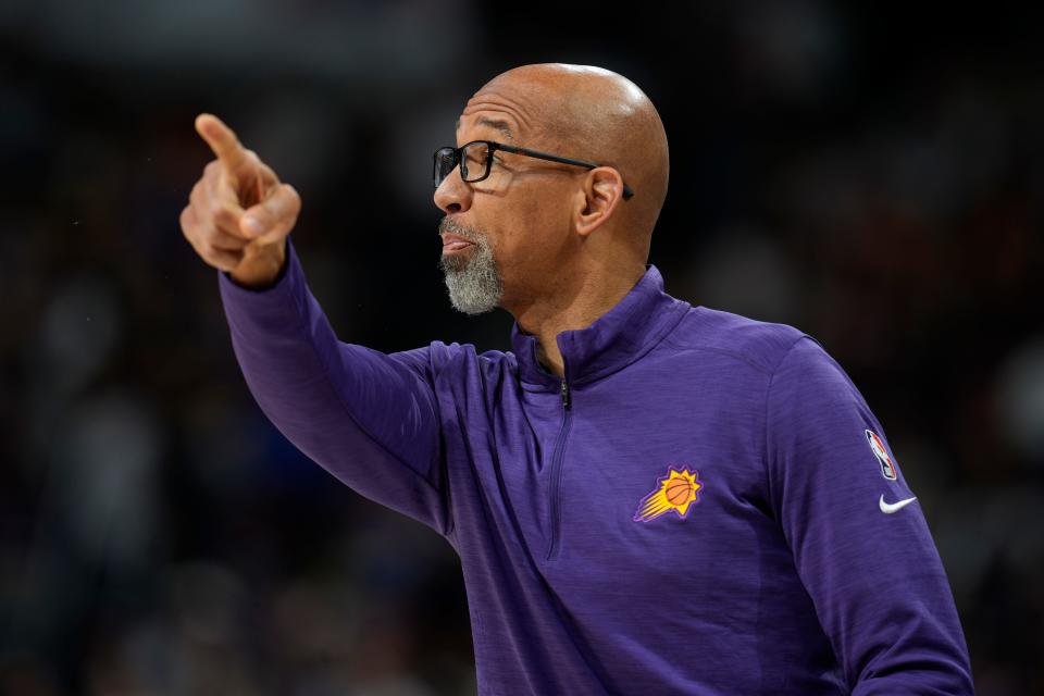 Phoenix Suns coach Monty Williams gestures during the first half of the team's NBA basketball game against the Denver Nuggets on Thursday, March 24, 2022, in Denver.