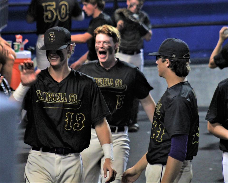 Campbell County players celebrate one of their early runs as Campbell County lost in the KHSAA state baseball quarterfinals June 4, 2022.