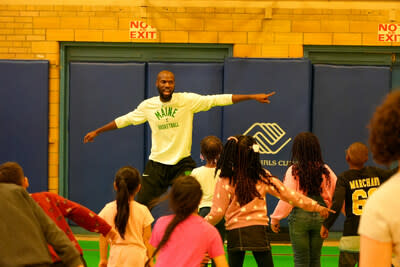 Maine Celtics Assistant Coach Ali Rugira leads a workout for Sun Life Fit to Win at the Boys and Girls Club of Southern Maine.