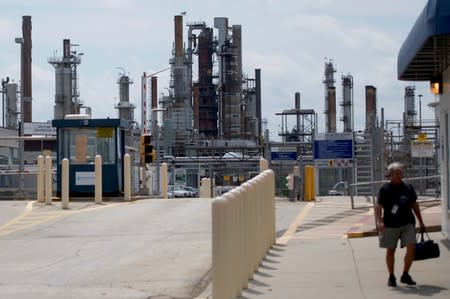 FILE PHOTO: A worker exits the Philadelphia Energy Solutions plant refinery in Philadelphia