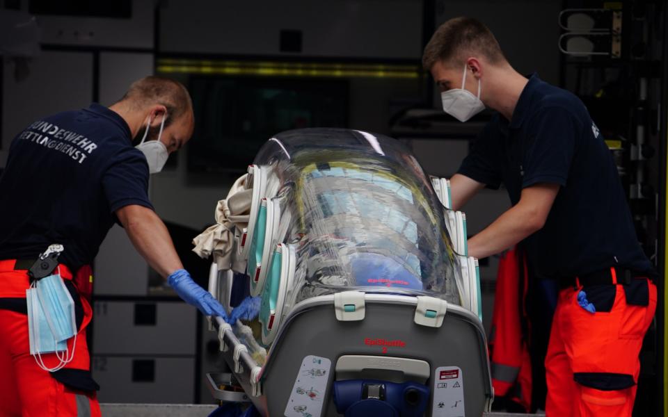 Mandatory Credit: Photo by CLEMENS BILAN/EPA-EFE/Shutterstock (10751900g) German Bundeswehr paramedics at the clinic after Russian opposition activist Alexei Navalny arrived at Charite clinic in Berlin, Germany, 22 August 2020. Navalny was first placed in an hospital in Omsk, Russia, after he felt bad on board of a plane on his way from Tomsk to Moscow. The flight was interrupted and after landing in Omsk Navalny was delivered to hospital with a suspicion on a toxic poisoning. The hospital management agreed on 21 August 2020 to transport Navalny to a German hospital for further treatment. Russian opposition activist Alexei Navalny arrives in Germany after alleged poisoning, Berlin - 22 Aug 2020 - CLEMENS BILAN/EPA-EFE/Shutterstock