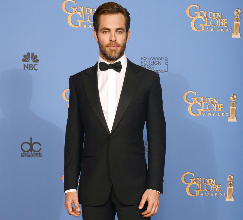 FILE - In this Sunday, Jan. 12, 2014 file photo, actor Chris Pine poses in the press room at the 71st annual Golden Globe Awards at the Beverly Hilton Hotel, in Beverly Hills, Calif. Pine says the US should have done more in the run-up to the Olympics to protest Russia’s anti-gay legislation, which he calls “clearly awful, archaic, hostile nonsense.” “I think we should do more than just send gay Olympians there,” he said in an interview while promoting his film “Jack Ryan: Shadow Recruit," which opens Friday, Jan. 17, 2014. (Photo by Jordan Strauss/Invision/AP)