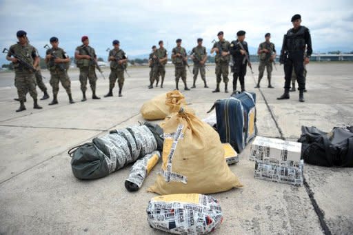 Las armas y demás pruebas fueron encontradas en el departamento de Cobán, a 215 kilómetros al norte de Ciudad de Guatemala, cuando detuvieron a presuntos miembros del cártel mexicano de Los Zetas, acusados de estar implicados en el asesinato de un fiscal y otras 27 personas en Peten en mayo de 2011. (AFP/Archivos | Johan Órdóñez)