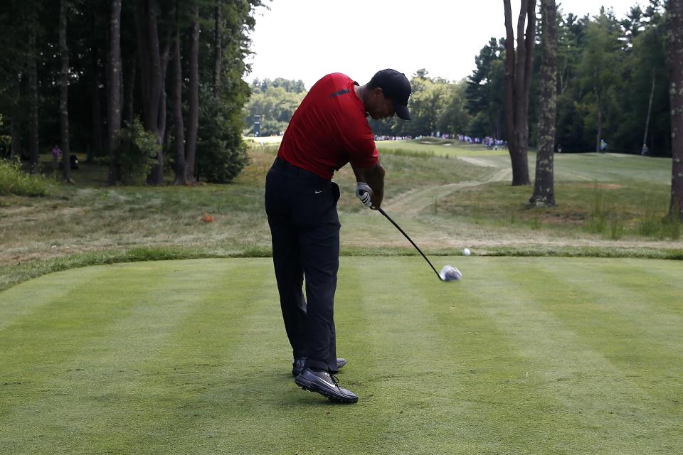 Tiger Woods tees off on the sixth hole during the final round of the Dell Technologies Championship golf tournament at TPC Boston in Norton, Mass., Monday, Sept. 3, 2018. (AP Photo/Michael Dwyer)