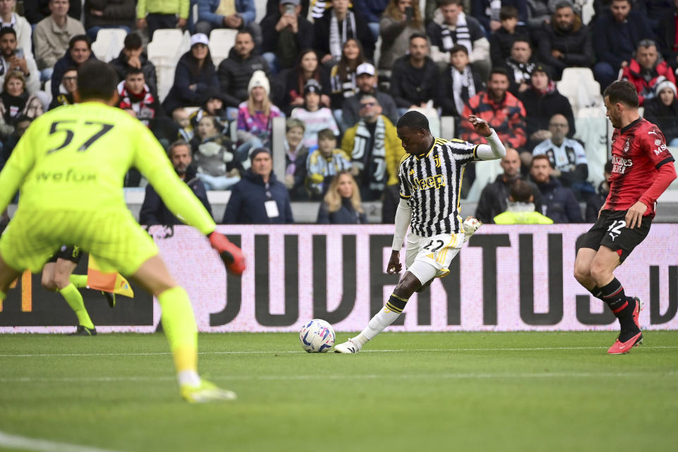 Juventus' Timothy Weah, center, prepares to shoot during a Serie A soccer match between Juventus and Milan at the Allianz Stadium in Turin, Italy, Saturday, April 27, 2024. (Marco Alpozzi/LaPresse via AP)