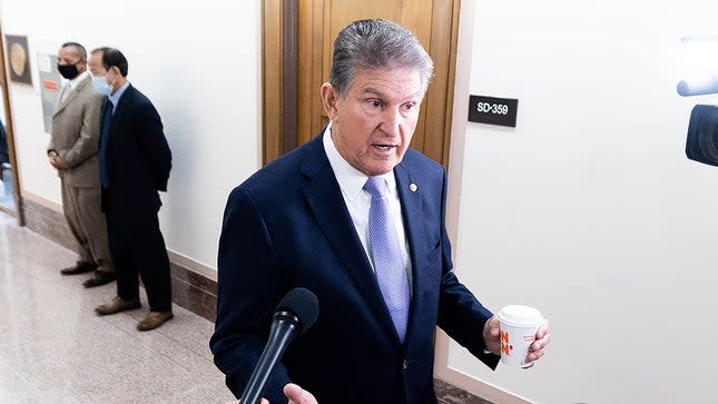 Sen. Joe Manchin (D-W.Va.) speaks to reporters prior to a Senate Energy and Natural Resources Committee hearing on Tuesday, Nov. 16, 2021.