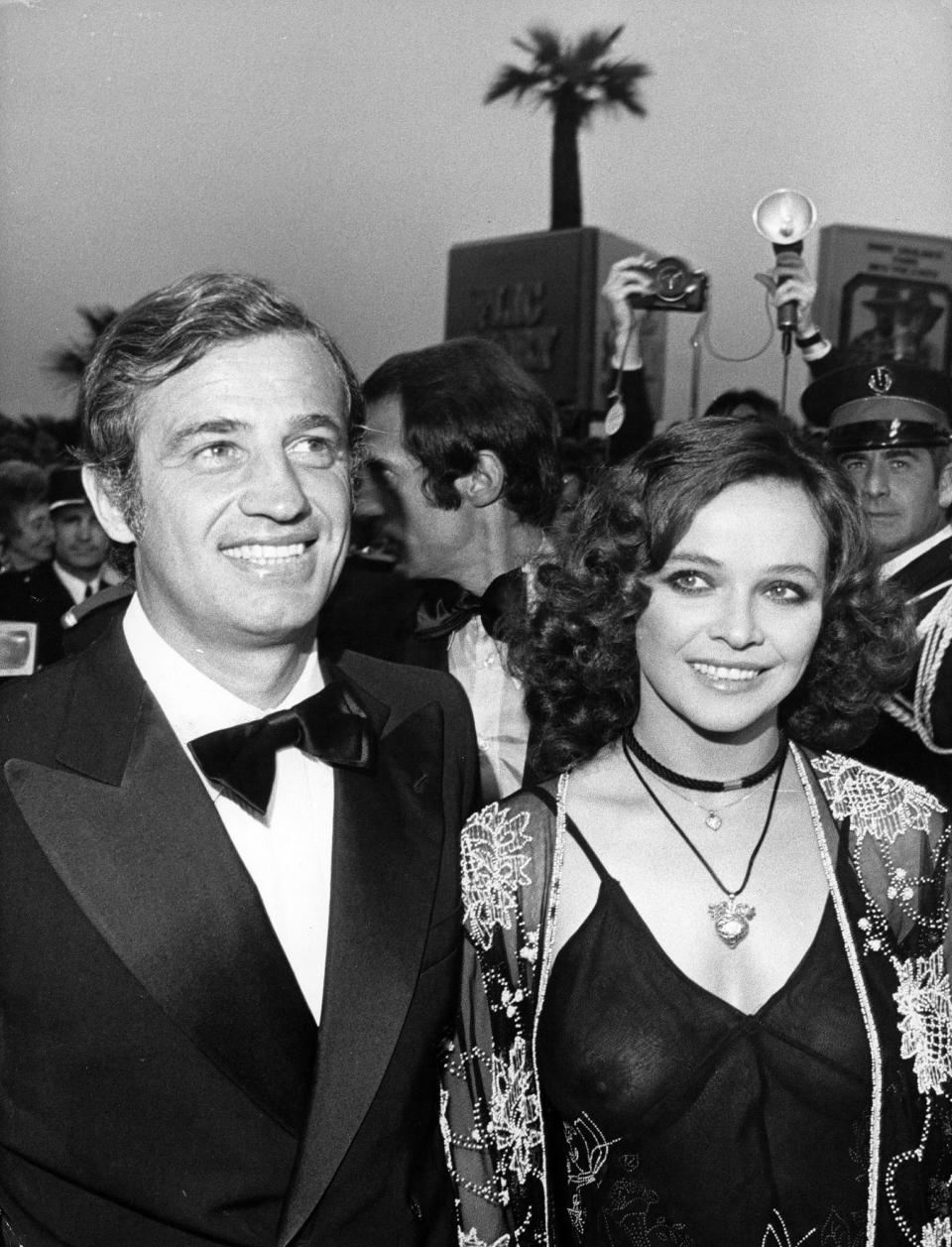 FILE - In this June 16, 1974 file photo, French actor Jean-Paul Belmondo and actress Laura Antonelli of Italy arrive at Festival House for presentation of film " Stavisky", on June 16, 1974. French New Wave actor Jean-Paul Belmondo has died, according to his lawyer’s office on Monday Sept. 6, 2021. (AP Photo/Levy, File)