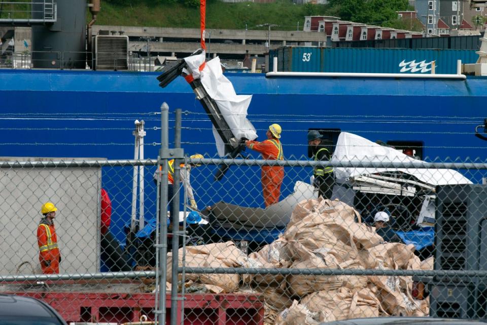 Photos shared by the Associated Press showed what appeared to be several pieces covered with white tarps being unloaded from the American ships Sycamore and Horizon Arctic at a port in St John’s, Newfoundland. (AP)