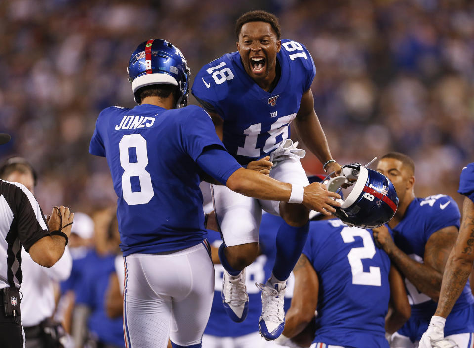 New York Giants wide receiver Bennie Fowler (18) and quarterback Daniel Jones (8) celebrate after a touchdown against the Chicago Bears during the second quarter of a preseason NFL football game, Friday, Aug. 16, 2019, in East Rutherford, N.J. (AP Photo/Adam Hunger)