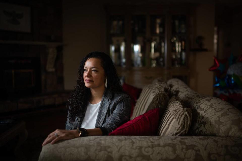 Orangevale resident Laiza Negrete, who helped her mother-in-law and father-in-law file for unemployment benefits over the phone during the coronavirus pandemic, sits at her Orangevale home on Wednesday, March 3, 2021. A recent study found that eligible California Latino workers are less likely to receive unemployment insurance benefits due to a lack of internet access and computer proficiency.