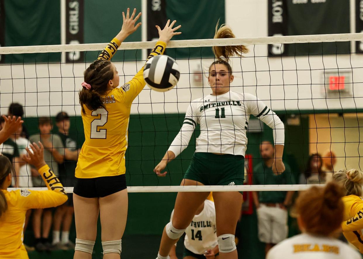 Smithville's Naomi Keib hammers home a kill against Waynedale.