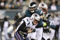 New England Patriots' Tom Brady (12) is tackled by Philadelphia Eagles' Nate Gerry (47) during the second half of an NFL football game, Sunday, Nov. 17, 2019, in Philadelphia. (AP Photo/Michael Perez)