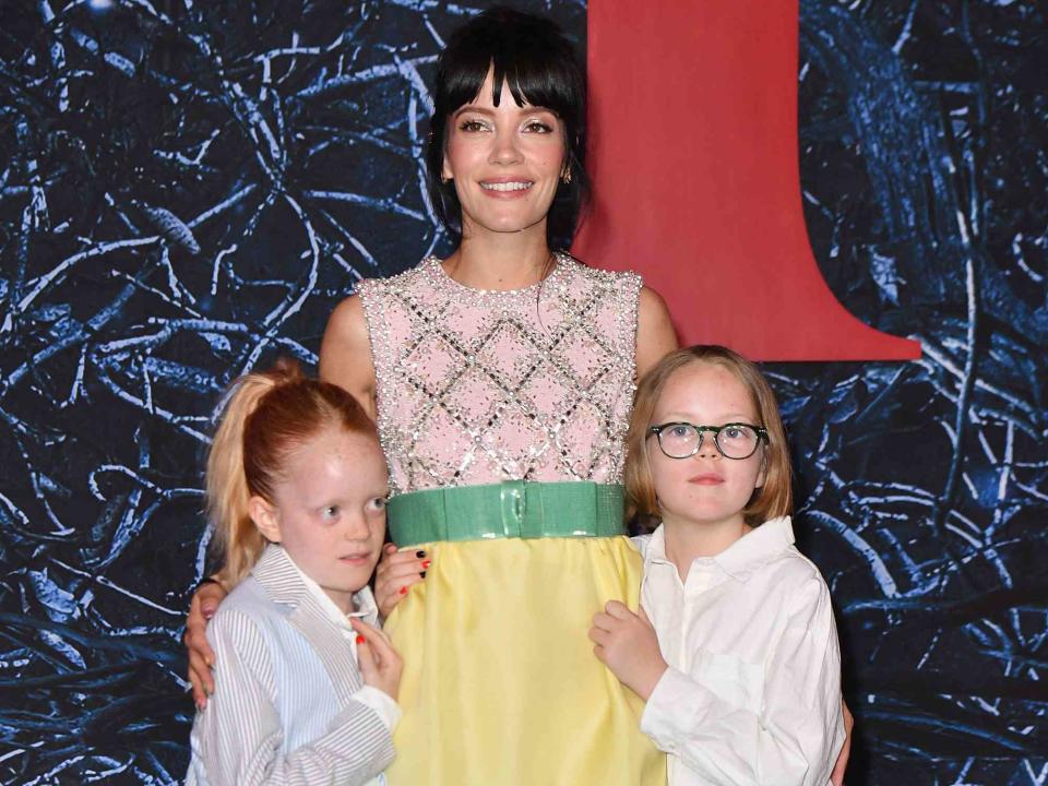 <p>ANGELA WEISS/AFP/Getty</p> Lily Allen and daughters Marnie Rose Cooper and Ethel Cooper attend "Stranger Things" season 4 premiere on May 14, 2022.  