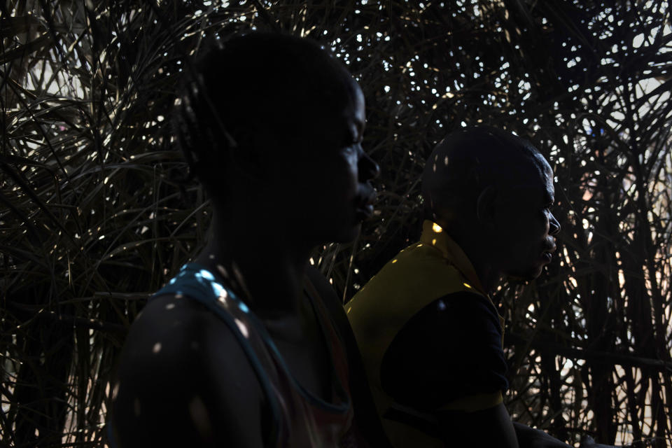 A man who requested to remain anonymous who fled Bangassou, Central African Republic, is photographed in the village of Siwa where he and his wife found refuge Saturday Feb. 13, 2021. The 44-year-old farmer hopes his wife will receive treatment and psychological support after the was raped by armed men. An estimated 240,000 people have been displaced in the country since mid-December, according to U.N. relief workers, when rebels calling themselves the Coalition of Patriots for Change launched attacks, causing a humanitarian crisis in the already unstable nation. (AP Photo/Adrienne Surprenant)