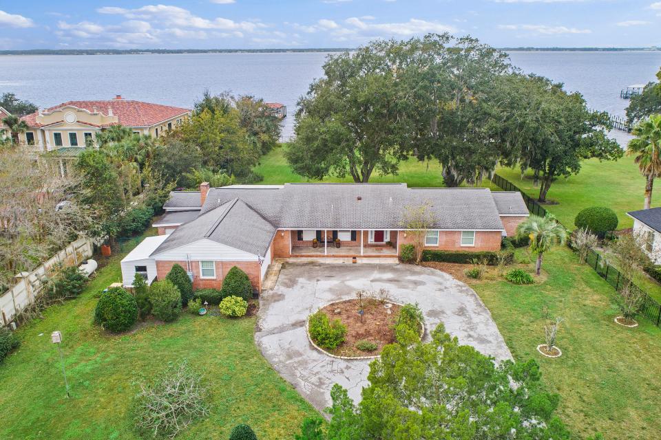Perched on a 1.3-acre lot at the edge of the St. Johns, this classic all-brick ranch house at 1348 Baylor Lane sold for $1.6 million on Dec. 5.