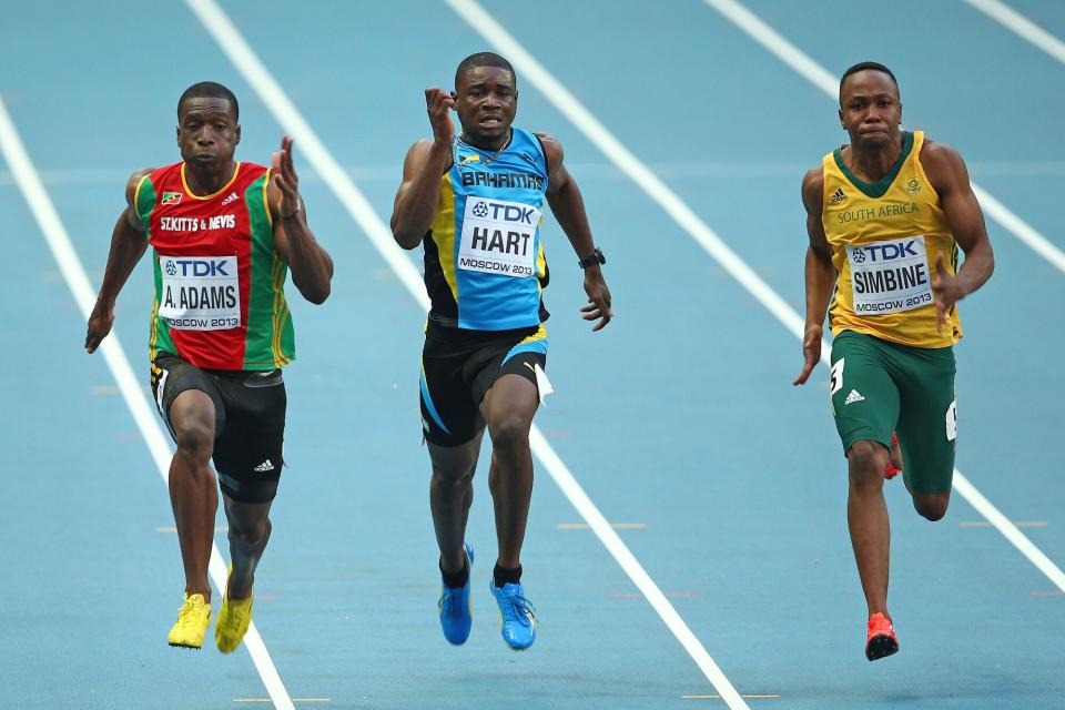 Antoine Adams of Saint Kitts and Nevis, Shavez Hart of Bahamas and Akani Simbine of South Africa compete in the Men's 100 metres heats during Day One of the 14th IAAF World Athletics Championships Moscow 2013 at Luzhniki Stadium on August 10, 2013 in Moscow, Russia.