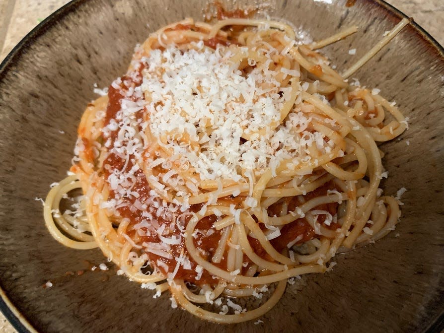 Roasted-garlic marinara on spaghetti with Parmesan cheese