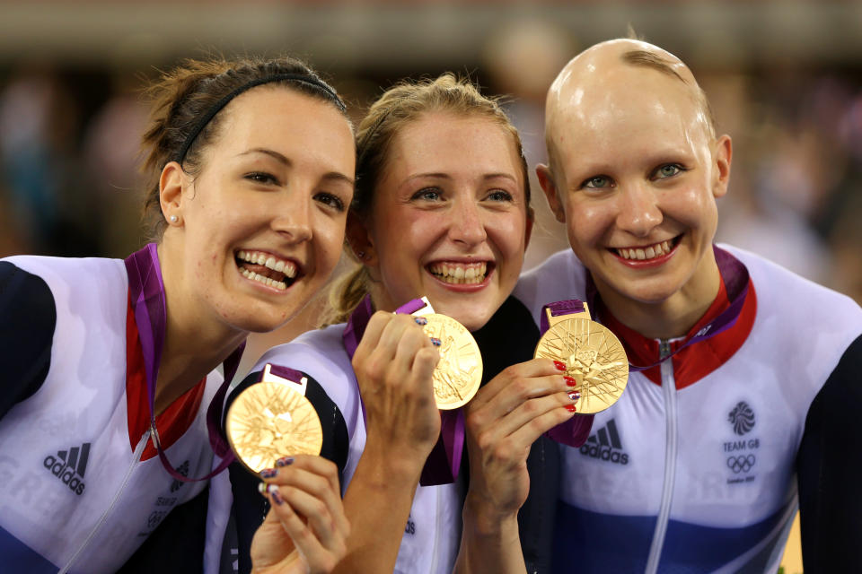 LONDON, ENGLAND - AUGUST 04: (L-R) Dani King, Laura Trott, and Joanna Rowsell of Great Britain pose with their Gold medal in the medal ceremony for the Women's Team Pursuit Track Cycling Finals after breaking the World Record on Day 8 of the London 2012 Olympic Games at Velodrome on August 4, 2012 in London, England. (Photo by Bryn Lennon/Getty Images)