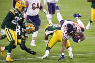 Chicago Bears' David Montgomery is stopped during the first half of an NFL football game against the Green Bay Packers Sunday, Nov. 29, 2020, in Green Bay, Wis. (AP Photo/Matt Ludtke)