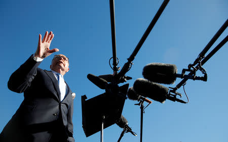 White House economic adviser Larry Kudlow speaks to the media outside the White House in Washington, U.S., December 3, 2018. REUTERS/Jim Young