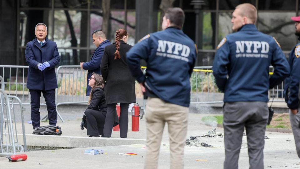 PHOTO:  Emergency personnel respond to a report of a person covered in flames, outside the courthouse where former President Donald Trump's criminal hush money trial is underway, in New York, April 19, 2024. (Brendan Mcdermid/Reuters)