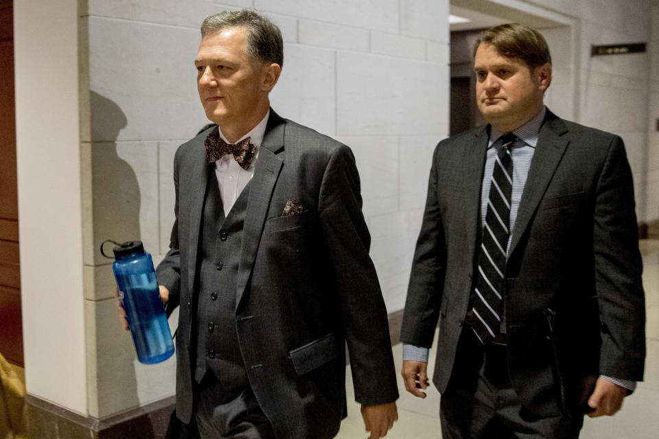 FILE - In this Oct. 15, 2019, file photo, Deputy Assistant Secretary of State George Kent arrives on Capitol Hill in Washington. House impeachment investigators released a transcript from Kent, a career official at the State Department on Nov. 7. He testified that he was told to "lay low" on Ukraine policy as the Trump administration, and the president's personal attorney Rudy Giuliani, were interacting with Ukraine outside of traditional foreign policy channels. (AP Photo/Andrew Harnik, File)