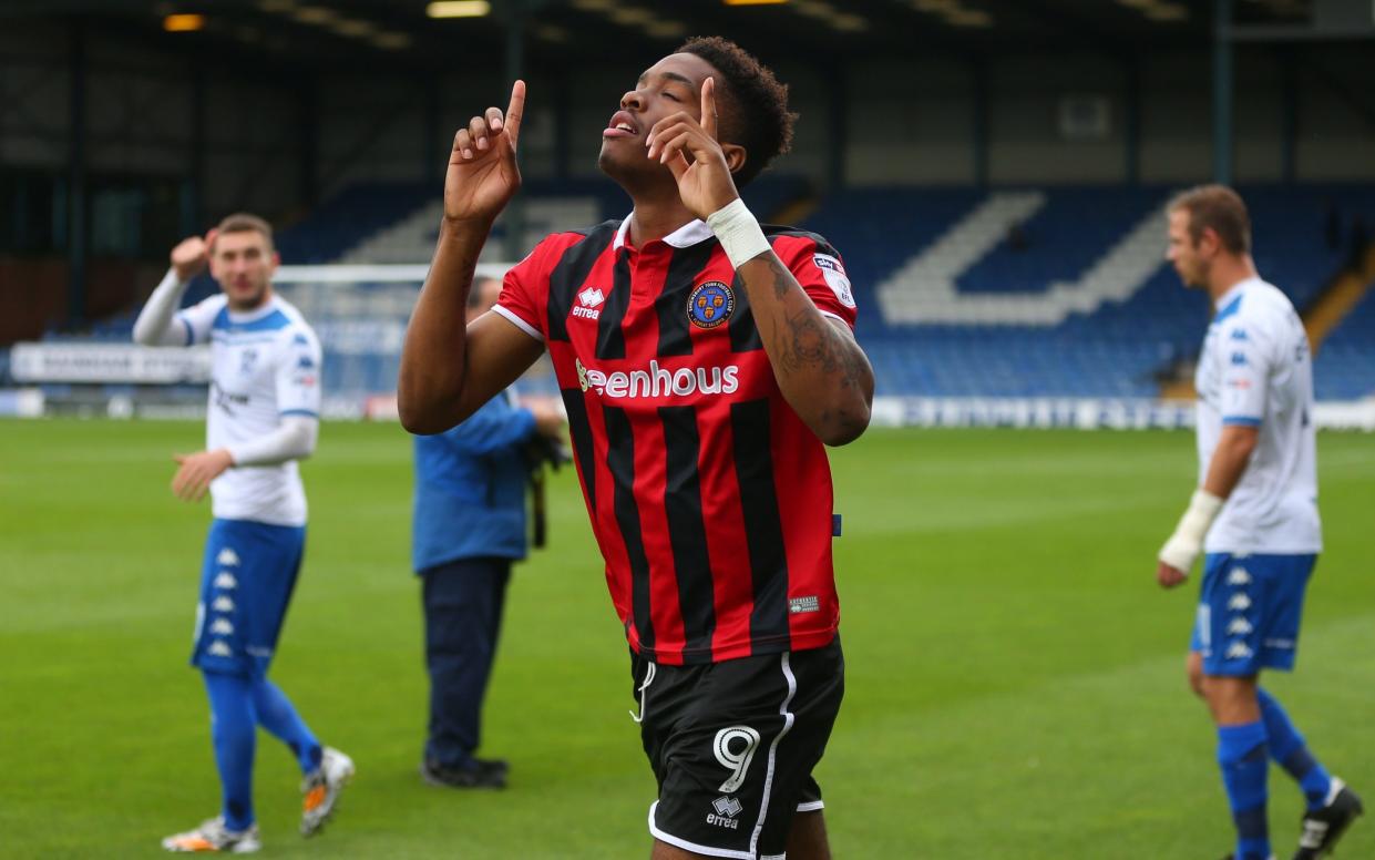 A young Ivan Toney, playing for Shrewsbury in 2016, says a prayer as he enters the pitch