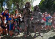 <p>Artists called “Les Emmeles” take part in the festival “Statues en Marche” in Marche-en-Famenne, Belgium, July 22, 2018. (Photo: Yves Herman/Reuters) </p>