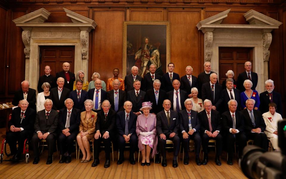 Lord Patten (front row, second from left) at the Queen’s centenary celebration for her Companions of Honour - Credit: Adrian Dennis/PA