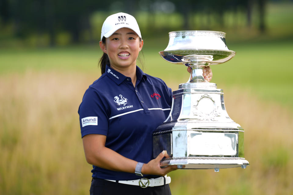 Ruoning Yin, of China, holds the trophy after winning the Women's PGA Championship golf tournament, Sunday, June 25, 2023, in Springfield, N.J. (AP Photo/Matt Rourke)