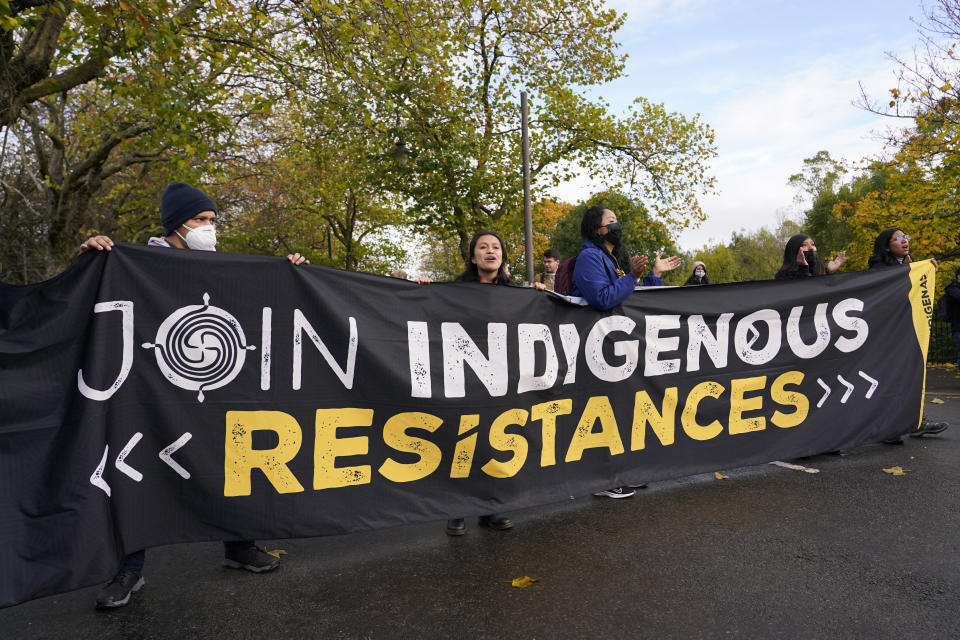 Climate activists march through the streets of Glasgow, Scotland, Friday, Nov. 5, 2021 which is the host city of the COP26 U.N. Climate Summit. The protest was taking place as leaders and activists from around the world were gathering in Scotland's biggest city for the U.N. climate summit, to lay out their vision for addressing the common challenge of global warming. (AP Photo/Alberto Pezzali)