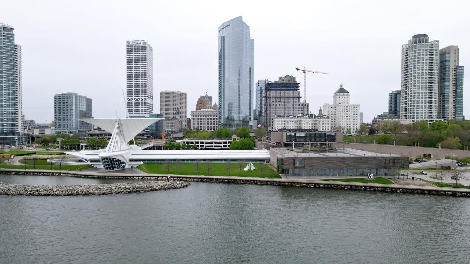 The Milwaukee Art Museum (left) and the Milwaukee County War Memorial Center are among the city's attractions on the edge of Lake Michigan which are seeing changes in response to higher water levels.