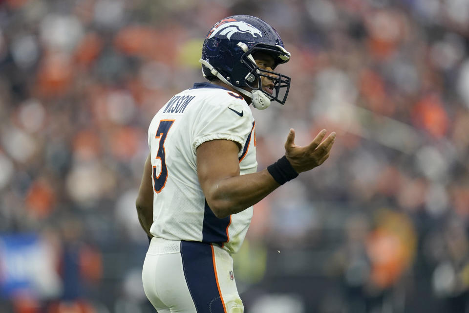 Denver Broncos quarterback Russell Wilson (3) looks to his bench after an incomplete pass against the Las Vegas Raiders during the second half of an NFL football game, Sunday, Oct. 2, 2022, in Las Vegas. (AP Photo/Abbie Parr)