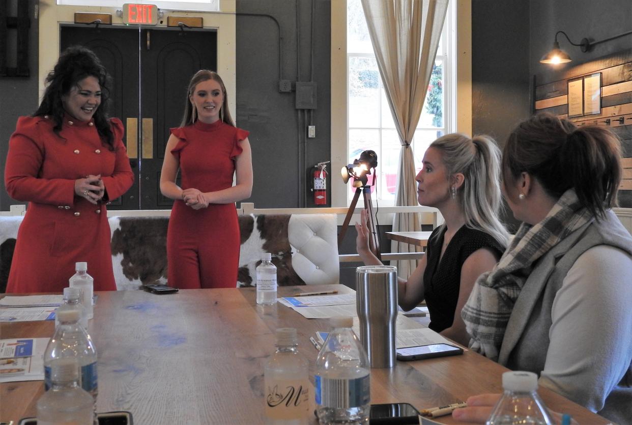 Vicki Maple and Madison Miller listen to Miss Ohio Lora Current as Tiffany Swigert of the Coshocton Port Authority watches. Current recently came to Coshocton to participate in a mock judges panel as preparation for Miss America. Miller wants to pursue the title of Miss Ohio in 2022.