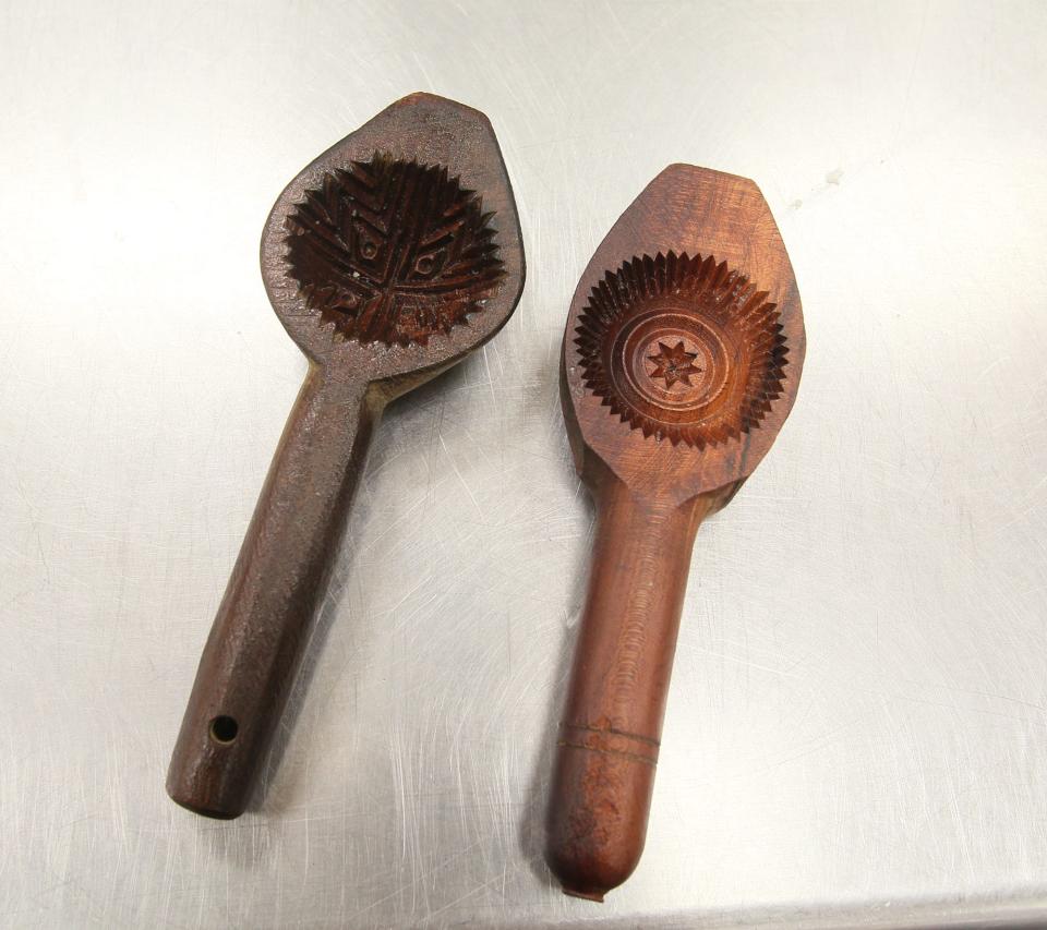 These 100-year-old wood molds are used to make ma'mool cookies, a traditional Lebanese pastry, at Our Lady of the Cedars in Fairlawn.