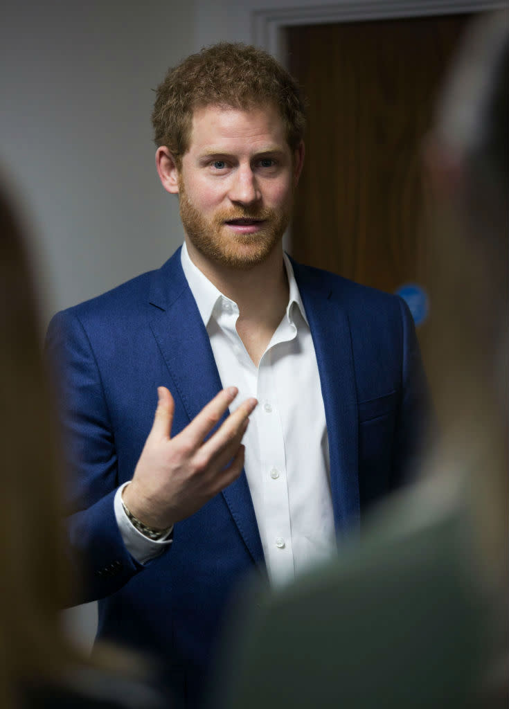 Prince Harry Visits Big White Wall In Navy Suit