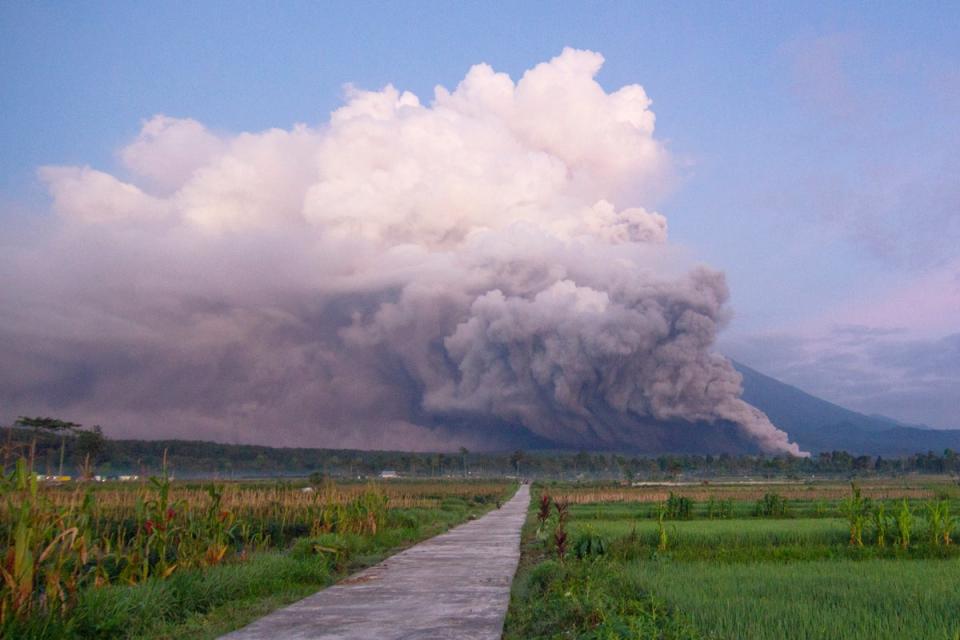 Mount Semeru releases volcanic materials during an eruption on Sunday (AP)