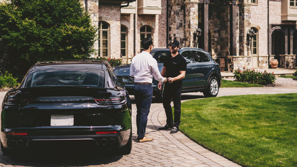 A Porsche Drive representative delivers and picks up Porsches at a client's home.